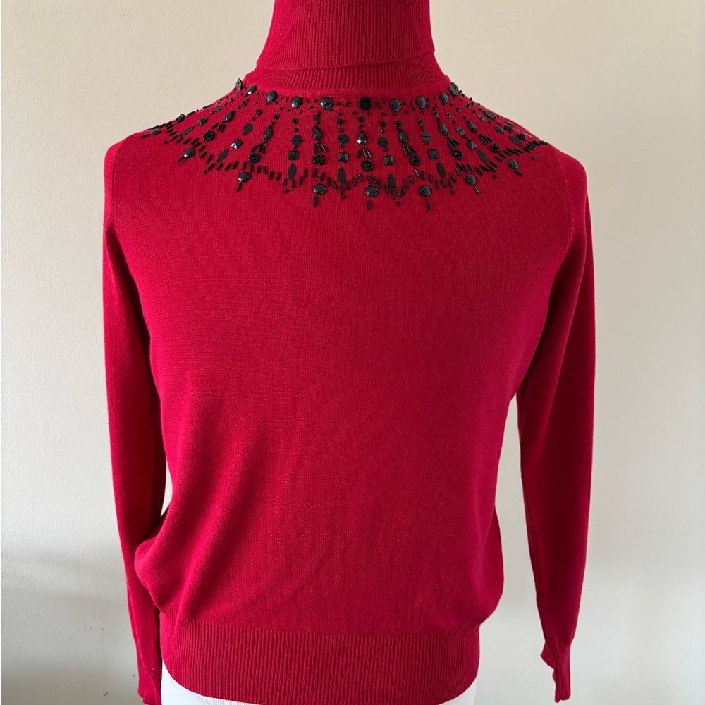 Red Turtleneck Sweater with Black Embellishments